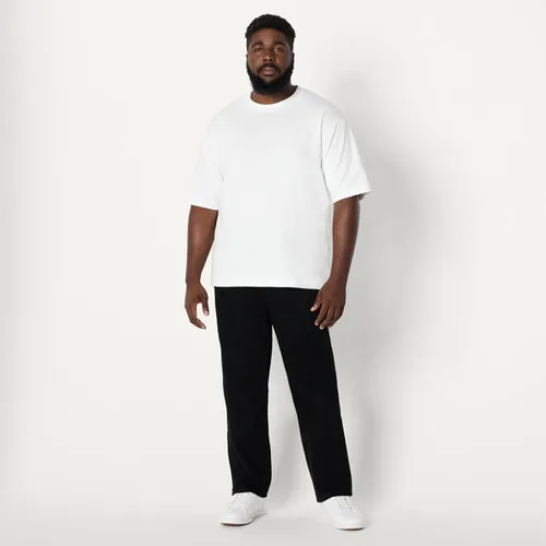 Miniatura 7 de Amazon Essentials - Pantalones vaqueros de elástico bajo de corte recto para hombre