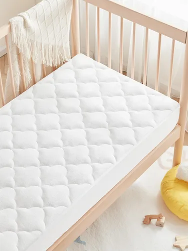 SLEEP ZONE Protector de colchón impermeable para cuna, acolchado, ajustable, de 28 x 52 pulgadas, suave y transpirable, protector de cama infantil