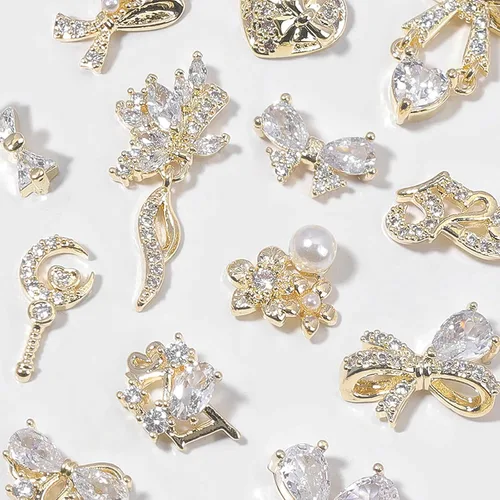 Miniatura 6 de Dijes y gemas para uñas, circonita de cobre dorado, múltiples formas 3D, diamantes de imitación de metal de lujo para uñas, 14 piezas