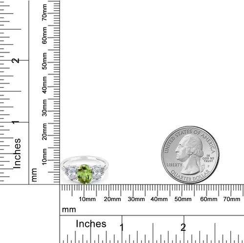 Miniatura 34 de Anillo de compromiso ovalado de oro blanco de 10 quilates con piedra natal y topacio blanco de 3 piedras con detalles de diamante Centro de 0.315