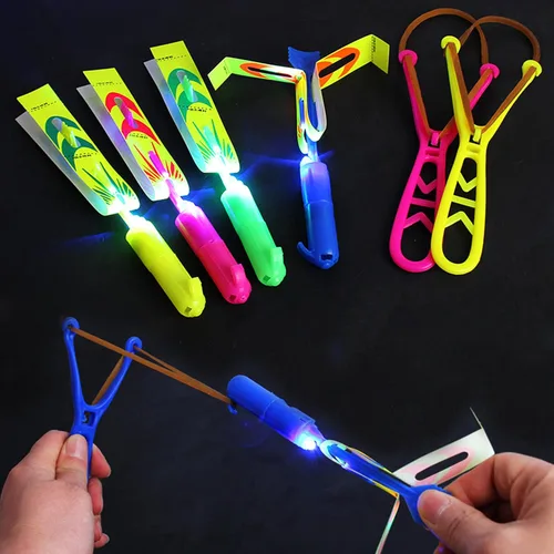 Miniatura 7 de Increíbles juguetes voladores LED para niños pequeños – 12 piezas de juguete de helicóptero LED con luz – Aviones de flecha que brillan