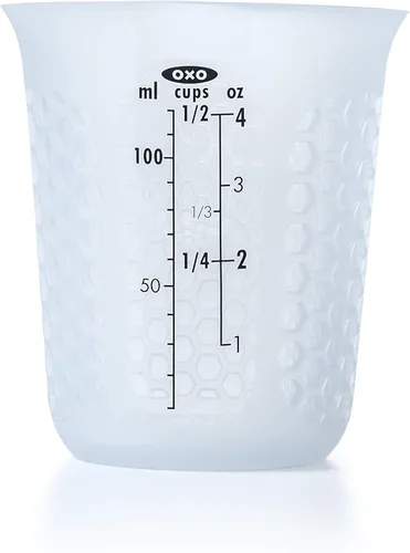 Miniatura 10 de 1 taza de medir de silicón para exprimir y verter, con patrón Stay-Cool, de la marca Oxo Good Grips, Transparente