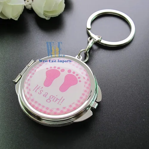 Miniatura 6 de 12 llaveros de espejo compacto para baby shower, con bolsa de organza, diseño de huella rosa