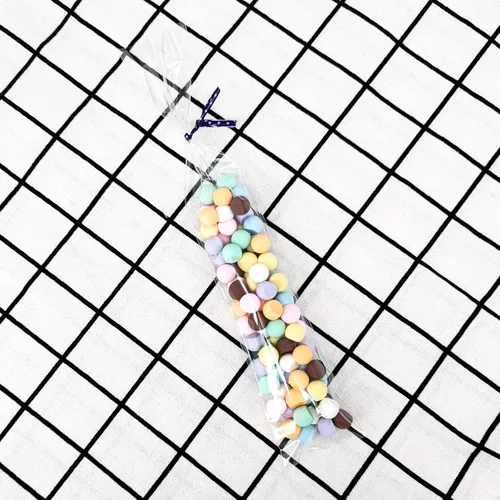 Miniatura 3 de Newkita Bolsas de golosinas transparentes, bolsas para pasteles y dulces con lazos giratorios de 4 pulgadas, paquete de 100