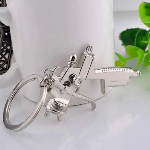 Miniatura 3 de Acxico Llavero de pistola de agua con pintura en aerosol, accesorios unisex, regalo para niños, Blanco