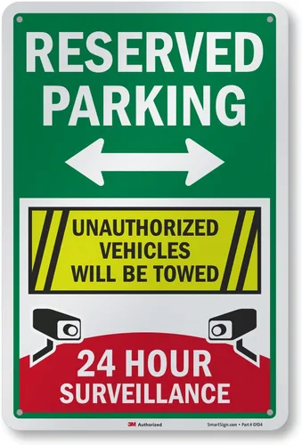 SmartSign Letrero metálico de 18 x 12 pulgadas con texto en inglés «Reserved Parking – Unauthorized Vehicles Will Be Towed, 24 Hour Surveillance ',