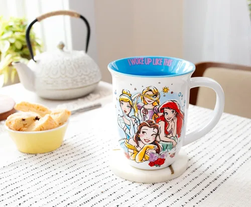 Miniatura 6 de Taza de cerámica de borde ancho Silver Buffalo Disney Princess “I Woke Up Like This” con Belle, Cenicienta, Ariel y Rapunzel, 16 onzas Blanco
