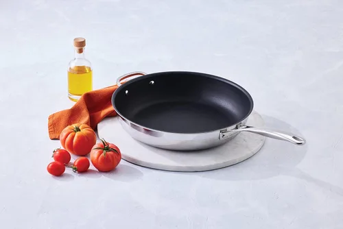 Miniatura 5 de Le Creuset Sartén antiadherente de acero inoxidable de tres capas de 12.5 pulgadas con mango auxiliar