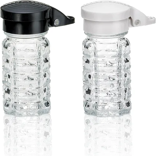 Shake-It-Free Salero y pimentero a prueba de humedad de Tumbler Home. Exclusivas tapas con resorte de color blanco y negro, a prueba de atascos,