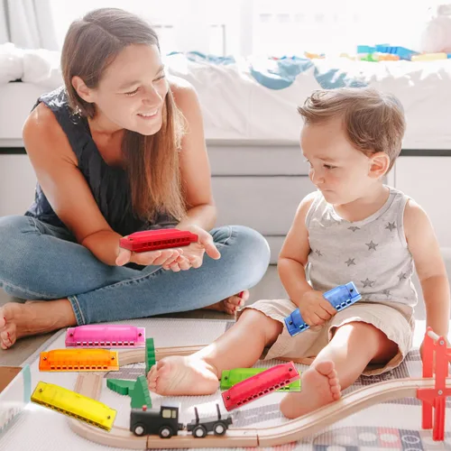 Miniatura 5 de Armónica de plástico para niños, 12 unidades, 10 agujeros, armónica translúcida, instrumentos musicales para niños y niñas, principiantes, 6