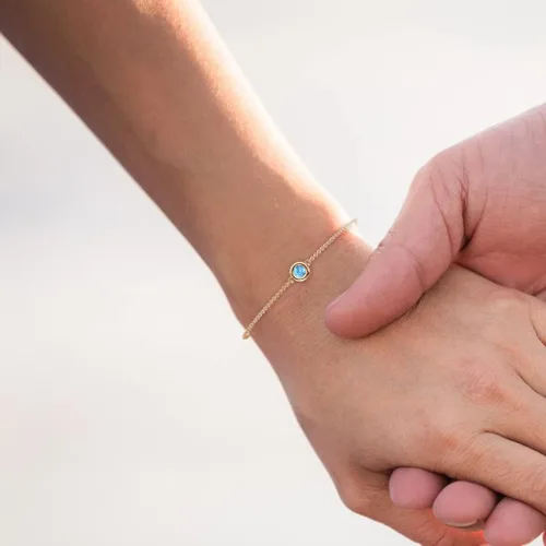 Miniatura 5 de Pulsera minimalista de topacio azul redondo de 0.14 quilates, oro de 14 quilates