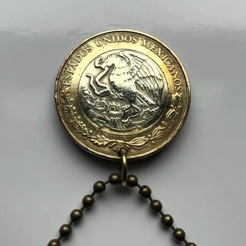 Miniatura 4 de 2021 México 10 Pesos moneda colgante azteca sol calendario piedra del sol piedra del sol escultura Méxica Tonatiuh Tlaltecuhtli Yohualtecuhtli