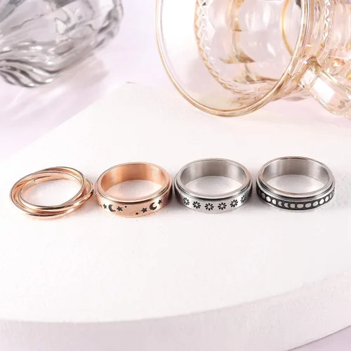 Miniatura 6 de FUNRUN JEWELRY Juego de 4 anillos giratorios de acero inoxidable para mujeres y hombres, anillos de banda para la ansiedad, luna, estrella, celta