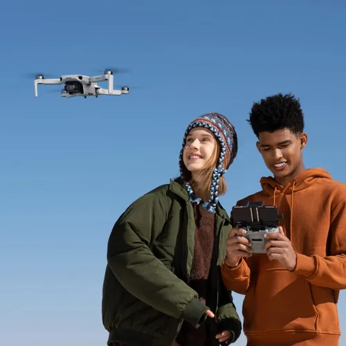 Miniatura 11 de DJI Mini 2 Fly More Combo – Dron plegable ultraligero, cardán de 3 ejes con cámara 4K, fotos de 12 MP, tiempo de vuelo de 31 minutos, transmisión