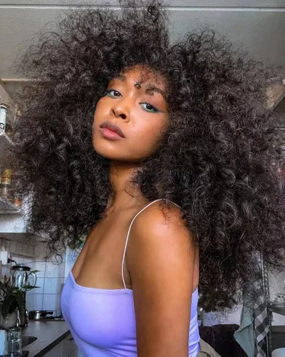 Miniatura 3 de Sweece - Peluca afro larga y rizada con flequillo para mujeres negras, peluca de cabello rizado de 17 pulgadas (17 pulgadas, negro)