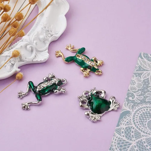 Miniatura 4 de KISSITTY 18 unids/caja de dijes de rana esmaltada con diamantes de imitación de rana verde, 3 estilos de dijes de animales de metal