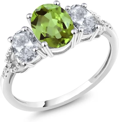 Miniatura 32 de Anillo de compromiso ovalado de oro blanco de 10 quilates con piedra natal y topacio blanco de 3 piedras con detalles de diamante Centro de 0.315