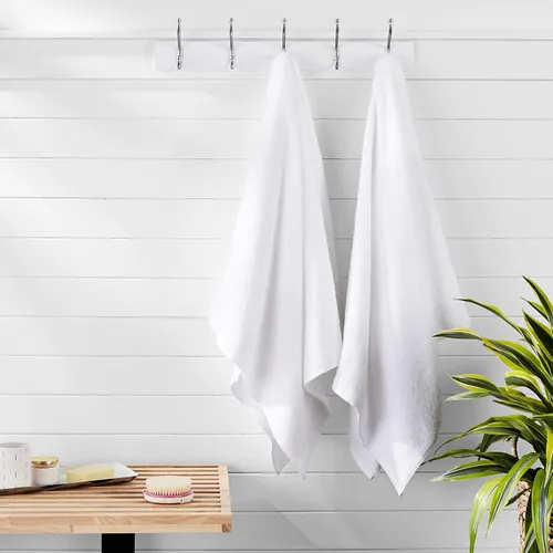 Miniatura 8 de Amazon Basics 2 toallas de baño de gran tamaño de secado rápido, 100% algodón, color blanco, de 62 x 30 pulgadas
