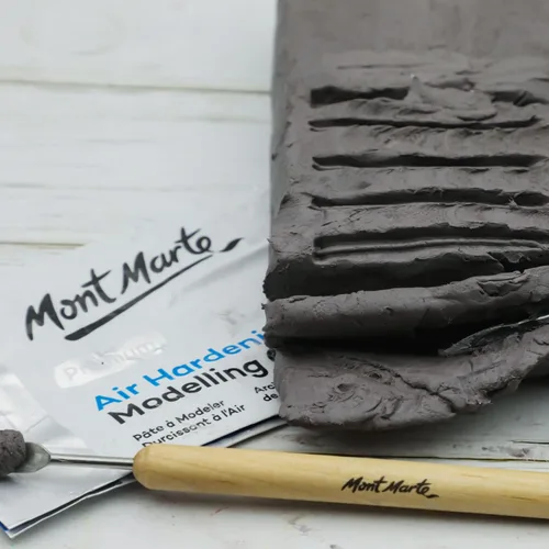 Miniatura 6 de Mont Marte Arcilla de modelado que se endurece con el aire gris, 500 g (1.1 lb). Se seca en aproximadamente 24 horas. Adecuada para escultores