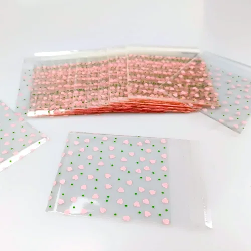 Miniatura 4 de 100 bolsas de celofán transparente con corazón rosa de San Valentín para suministros de panadería