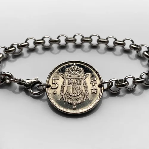 Miniatura 2 de 1975 España España 5 Peseta moneda escudo Español Juan Carlos I Madrid Barcelona Córdoba Valencia Málaga Sevilla Granada Toledo Bilbao Cádiz