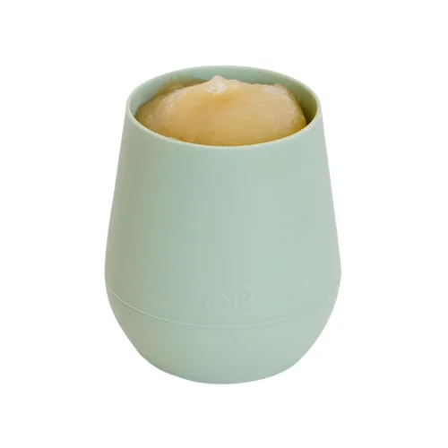 Miniatura 4 de ezpz Tiny Cup (Sage) - 4 meses en adelante - Taza de entrenamiento de 100% silicona para bebés - Diseñada por un especialista en alimentación Salvia