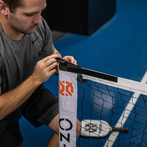 Miniatura 11 de ONIX Pickleball 2 en 1 Juego de red portátil de tamaño reglamentario y red de práctica incluye estuche de transporte con ruedas