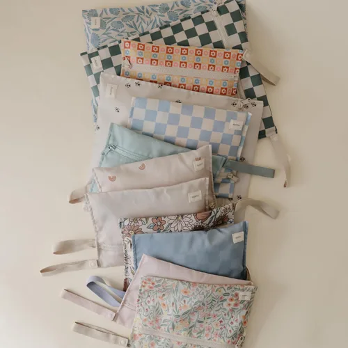 Miniatura 5 de mushie - Bolsas resistentes al agua para artículos húmedos Bolsas reutilizables grandes y pequeñas para artículos de bebé y viajes Bolsillos