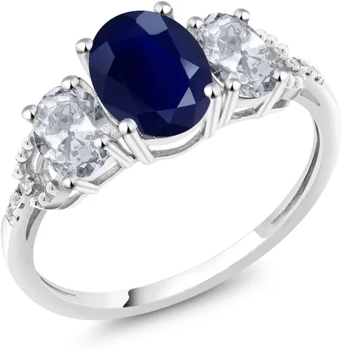Miniatura 28 de Anillo de compromiso ovalado de oro blanco de 10 quilates con piedra natal y topacio blanco de 3 piedras con detalles de diamante Centro de 0.315