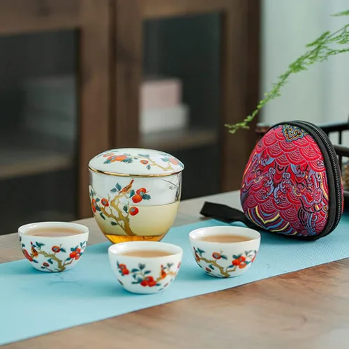 Miniatura 3 de Juego de té de cerámica portátil, juego de tetera de porcelana china de kungfu, tetera todo en uno, colador de té, 3 tazas de té, 1 bolsa de Naranja