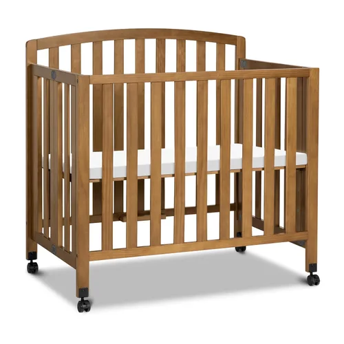 DaVinci Dylan Cuna portátil 3 en 1 para bebé con ruedas - Conversión a cama para niños pequeños y sofá cama - Perfecta para espacios pequeños y
