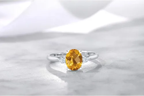 Miniatura 5 de Anillo de compromiso de oro blanco de 10 quilates con 3 piedras preciosas para mujer, piedra natal y zafiro blanco creado, ovalado de 0.315 x 0.236