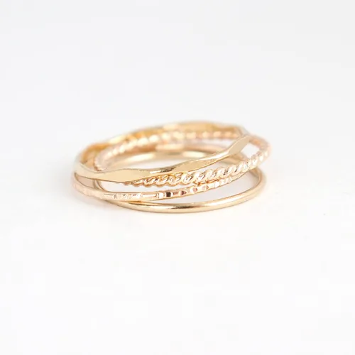Miniatura 5 de 14k yellow gold filled stacking rings. minimalist metal stack bands set of four (4). various texture options - smooth, hammered, stardust, twist, or