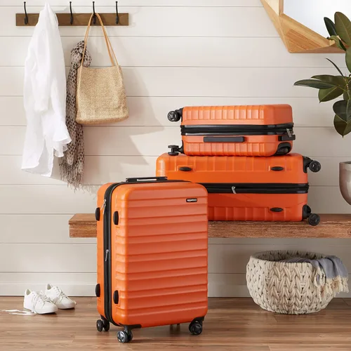 Miniatura 7 de Tienda Basics Equipaje de maleta expandible con ruedas rígidas, Naranja, Spinner