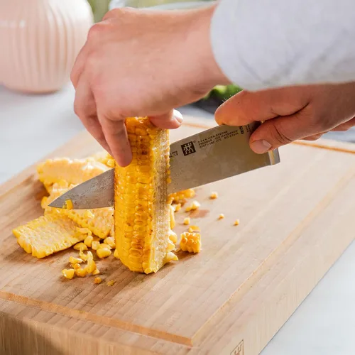 Miniatura 3 de ZWILLING Cuchillo de chef Four Star de 7 pulgadas