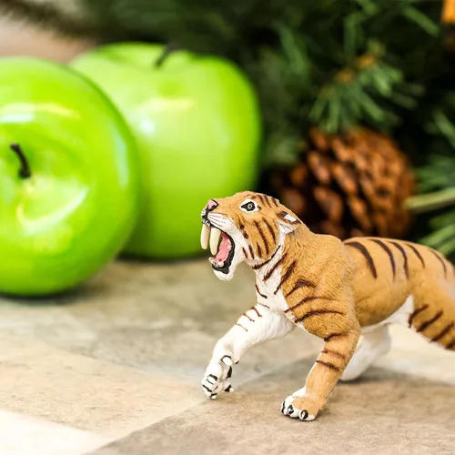 Miniatura 7 de Safari Ltd. Smilodon Figura de tigre dentado de sable de 4 pulgadas, juguete educativo para niños, niñas y niños a partir de 3 años