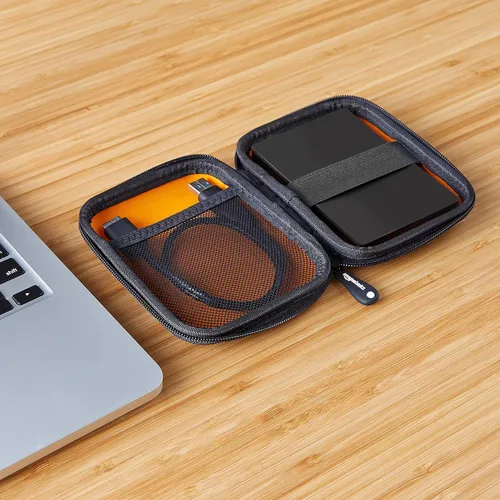 Miniatura 7 de Amazon Basics Estuche de transporte de carcasa dura pequeña para disco duro externo My Passport Essential 1 paquete, Negro