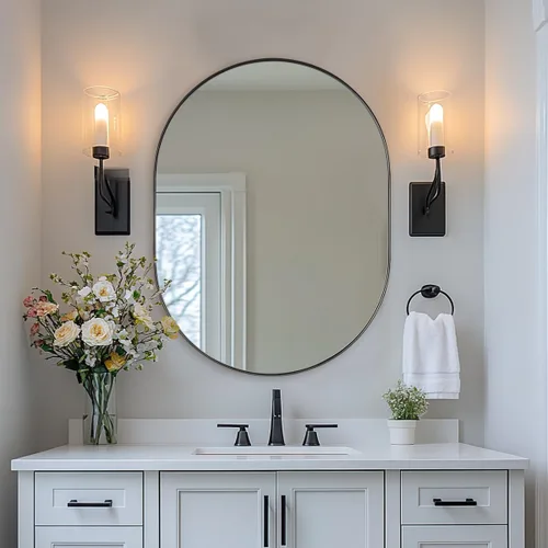 ANDY STAR Espejo ovalado de 24x32 pulgadas, espejo ovalado negro de diseño en forma de píldora en marco de metal de acero inoxidable para baño,
