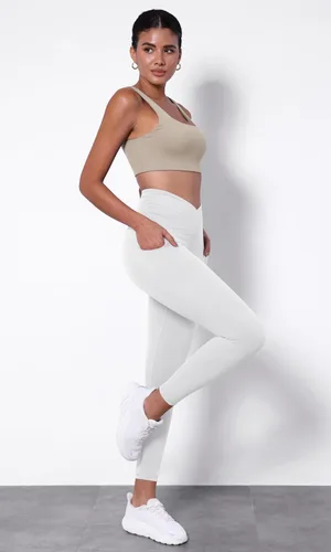 Miniatura 3 de ODODOS Leggings de yoga con cintura cruzada para mujer con bolsillos, pantalones de yoga de entrenamiento cruzado de 2528 pulgadas