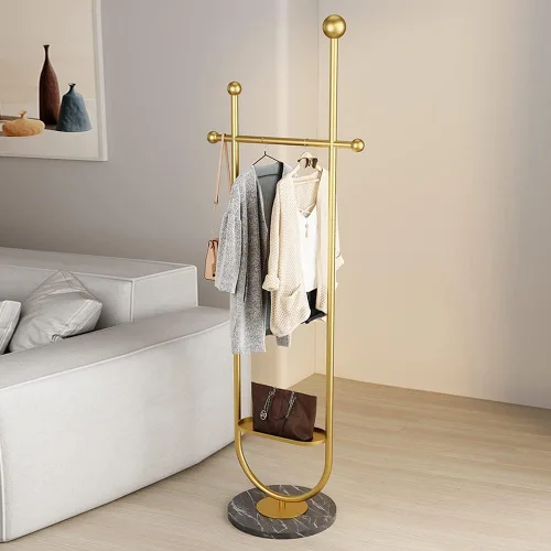 Miniatura 8 de Perchero minimalista dorado con base de mármol Tu centro de puesta en escena personal para trajes y elementos esenciales Perchero moderno