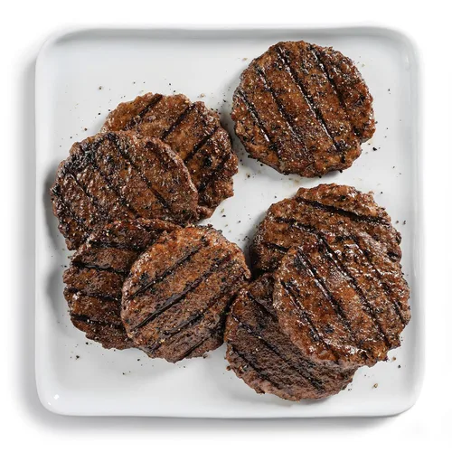 Miniatura 7 de Omaha Steaks PureGround® Burger Flight, 24 Artículos: 8 Hamburguesas Smash, 4 Filets Mignons, 4 Solomillos, 4 Porterhouse, 4 Tiras de Nueva York