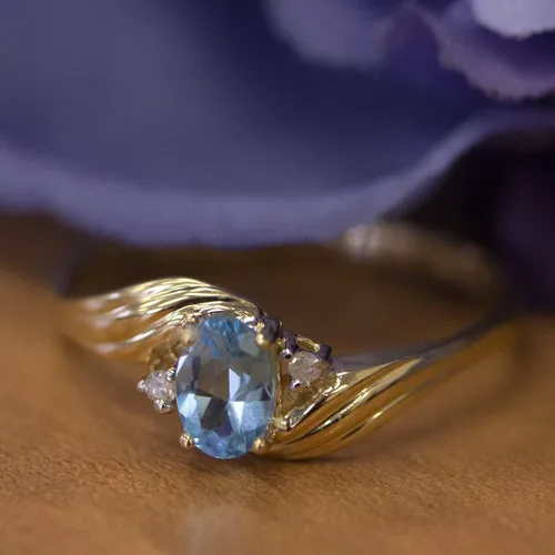 Miniatura 8 de Anillo de topacio azul y diamante en oro amarillo de 10 quilates