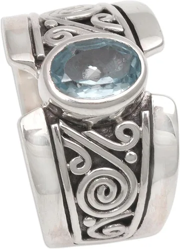 Miniatura 5 de NOVICA Anillo artesanal hecho a mano con topacio azul de una sola piedra de ley .925 ancho con piedra natal de serenidad de Indonesia 'Blue Karma