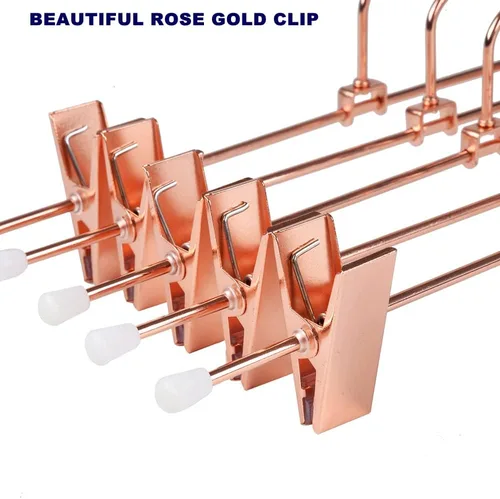 Miniatura 7 de Amber Home Paquete de 24 perchas de metal color oro cobre rosa de 12 pulgadas para pantalones con 2 clips antideslizantes ajustables y gancho