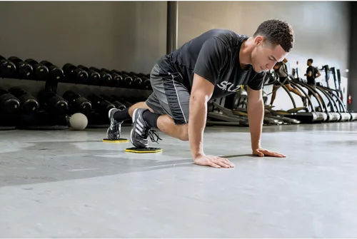 Miniatura 5 de SKLZ Slidez - Discos deslizantes de ejercicio de doble cara para ejercicios de estabilidad central para manos y pies, uso estándar, amarillo