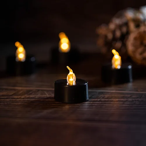 Miniatura 2 de LANKER Paquete de 24 velas de té negras – Luces LED sin llama amarillas cálidas parpadeantes – Velas falsas de larga duración a pilas – Decoración