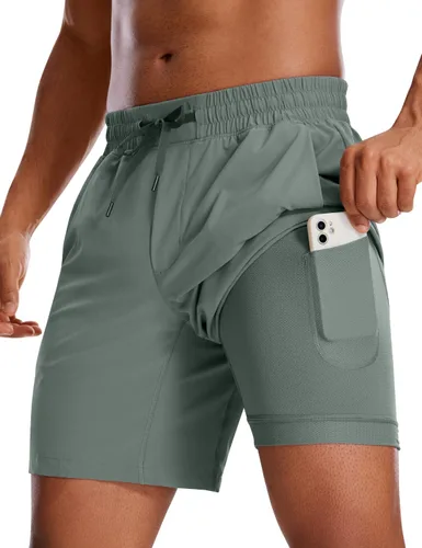 CRZ YOGA Pantalones cortos de correr 2 en 1 para hombre con forro 5, 7 y 9 pulgadas, de secado rápido, pantalones cortos deportivos con bolsillos