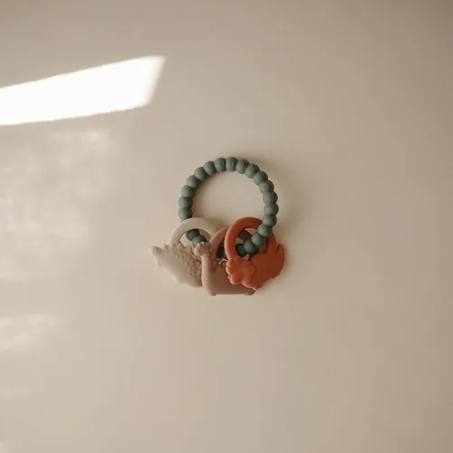 Miniatura 2 de mushie Anillo de dentición de dinosaurio de silicona de juguete