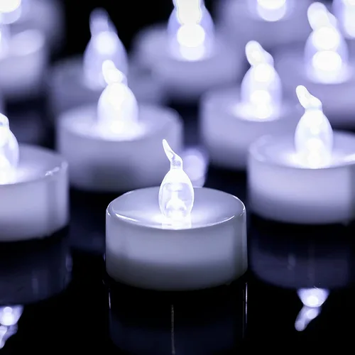Miniatura 16 de LANKER Paquete de 24 velas de té negras – Luces LED sin llama amarillas cálidas parpadeantes – Velas falsas de larga duración a pilas – Decoración