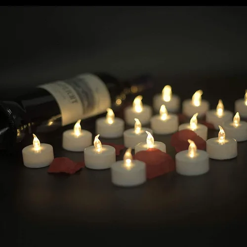 Nancia - Velas LED de té, paquete de 50 velas sin llama, realistas y brillantes, parpadeantes, de larga duración, 200 horas para celebración de